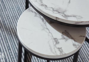Set of four black and white nesting tables by Signature Design, featuring modern, space-saving tables perfect for versatile living spaces.