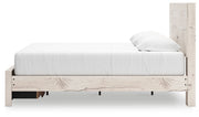Signature Design by Ashley Lawroy panel bed with storage drawers, showcasing a modern wood finish and built-in under-bed storage space.
