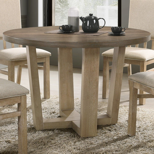Vintage walnut Brutus round dining table by Lilola Home with a wheat-colored base, showcasing a stylish, modern design.