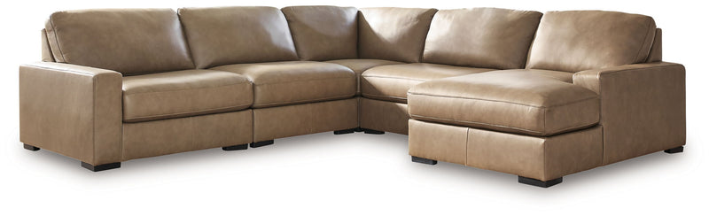 Benchcraft Veronella stationary sectional sofa with plush cushions and modern design, shown in a cozy living room setting.