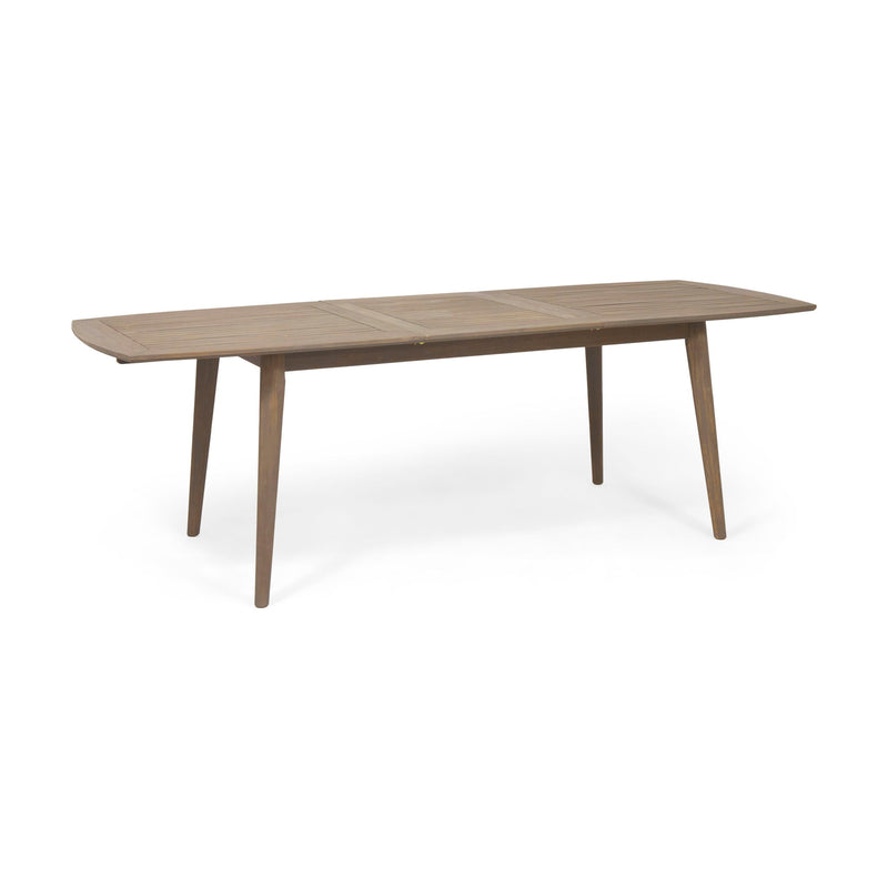 Outdoor Noble House Placidity expandable dining table with slatted tabletop and tapered legs, perfect for outdoor dining spaces.