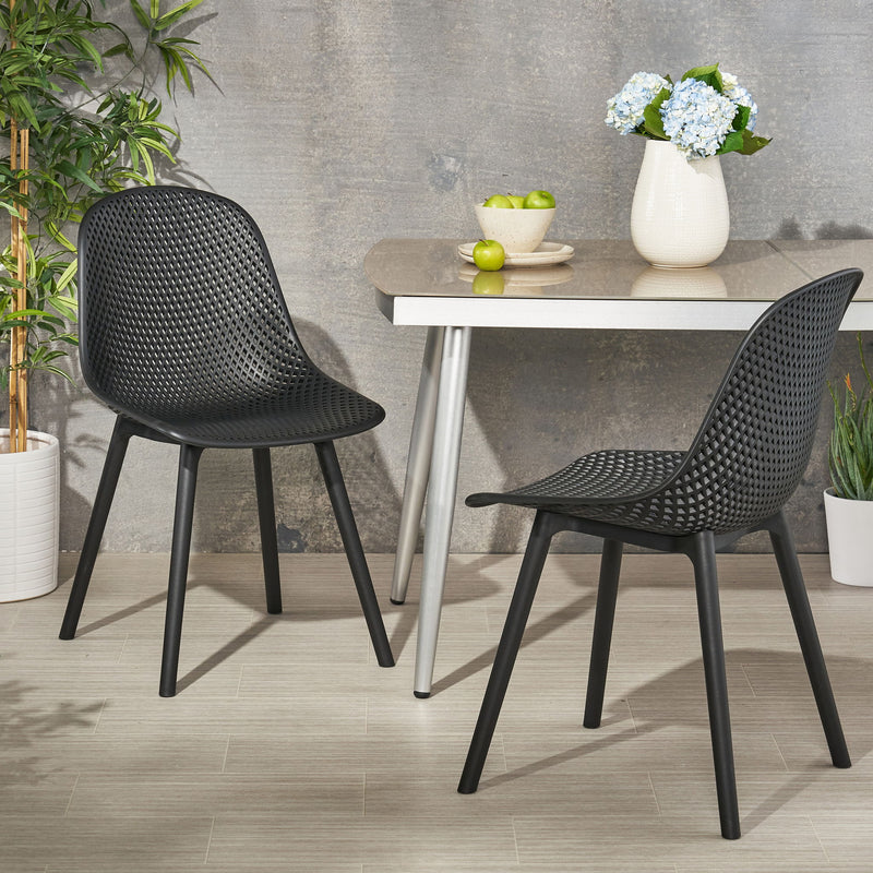 Set of two Noble House Posey chairs with wooden legs and cushioned seats, ideal for dining or living room decor.