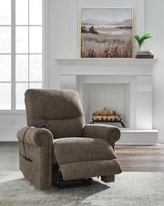 Signature Design by Ashley Aureta Power Lift Recliner in neutral fabric with padded armrests and plush cushioning.