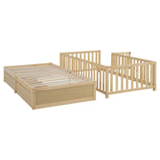 DreamHaus storage daybed with fence guardrails and two drawers, convertible into a floor bed and daybed, shown with bedding and pillows.