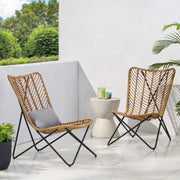 Set of two Noble House wicker chairs with geometric cross bases in light brown, featuring woven wicker seats and backrests.