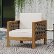 Outdoor acacia wood club arm chair with wicker accents from Noble House, featuring a sturdy frame and comfortable cushioned seating.