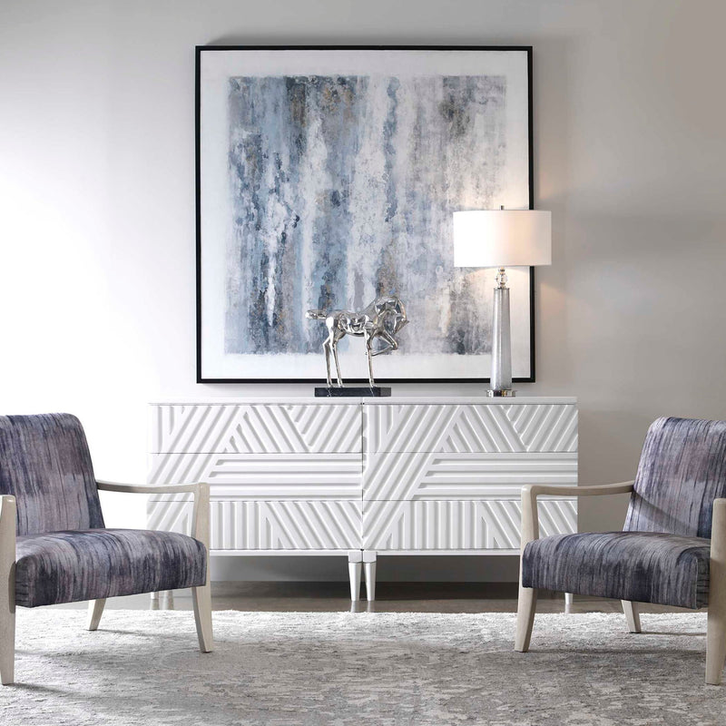 Uttermost Colby Drawer Chest accent chest with wood finish, metal accents, and multiple drawers, showcasing modern elegant furniture design.