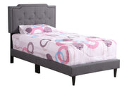 Button tufted upholstered bed by Glory Furniture with a cozy, chic design suitable for elegant bedroom spaces.
