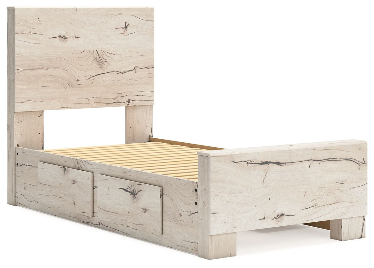 Signature Design by Ashley Lawroy panel bed with built-in storage drawers in a modern bedroom setting.