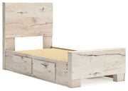 Signature Design by Ashley Lawroy panel bed with built-in storage drawers in a modern bedroom setting.