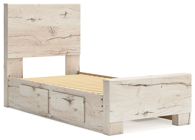 Signature Design by Ashley Lawroy panel bed with built-in storage drawers in a modern bedroom setting.
