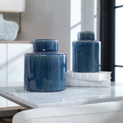 Set of two blue Saniya containers by Uttermost, decorative vases and jars with textured surfaces for stylish home decor.