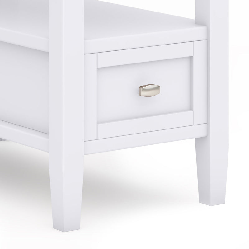 Warm Shaker handcrafted coffee table by Simpli-Home with a smooth wooden surface and sturdy legs in a classic shaker style.