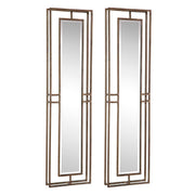 Set of two gold wall mirrors from Uttermost Rutledge collection, featuring elegant round frames and reflective glass surfaces.
