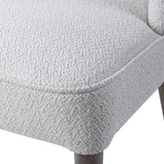 Set of two Uttermost Brie armless chairs with neutral fabric upholstery and modern design, ideal for contemporary living spaces.