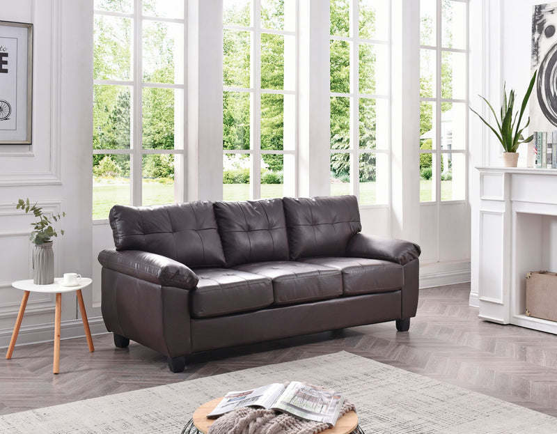 Comfortable stationary sofa by Glory Furniture with plush cushions and modern design, shown in a cozy living room setting.