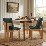 Set of two Noble House indoor dining chairs with cushioned seats and wooden legs, ideal for kitchen or dining room decor.