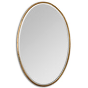 Herleva gold oval wall mirror by Uttermost featuring a sleek, elegant design perfect for modern interior decor.