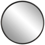 Round black accent mirror by Uttermost with a sleek modern frame, ideal for contemporary home decor.