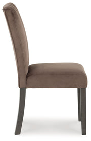 Set of two Jeshina dining upholstered side chairs in mocha fabric by Signature Design Ashley, showing padded seats and sleek backrests.