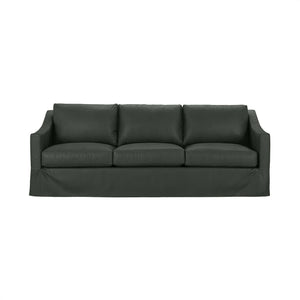 Classic Home Kipton upholstered stationary sofa with plush fabric and cushioned armrests in a modern living space.