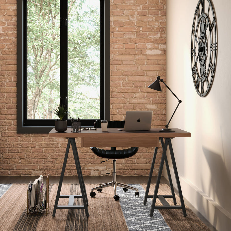 Handcrafted solid wood sawhorse-style writing desk by Simpli-Home with sturdy construction and natural wood finish.