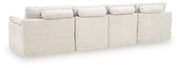 Ivory Fannin 4-piece stationary sectional with ottoman by Signature Design by Ashley, showcasing plush cushions and modern design.