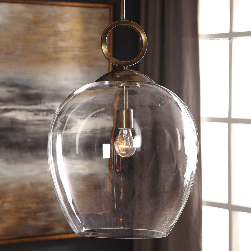 Large white blown glass pendant light from Uttermost, designed for pendant lighting in modern or contemporary interiors.