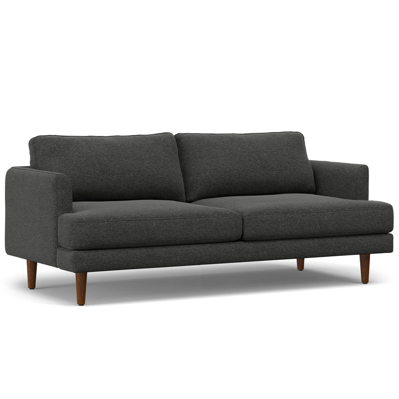 Livingston upholstered stationary sofa by Simpli-Home with plush fabric and cushioned armrests in a modern living room setting.