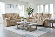 Signature Design by Ashley reclining living room set with plush sofas and loveseats, featuring reclining seats and modern upholstery.