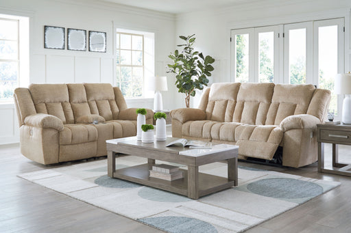 Signature Design by Ashley reclining living room set with plush sofas and loveseats, featuring reclining seats and modern upholstery.