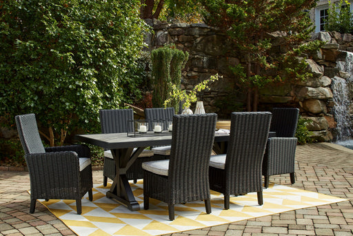 Signature Design by Ashley Beachcroft 7-piece outdoor dining set with a table and six chairs, perfect for outdoor gatherings.