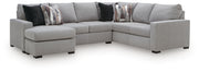 Benchcraft Lakepoint stationary sectional sofa with plush cushions and modern design, shown in a cozy living room setting.