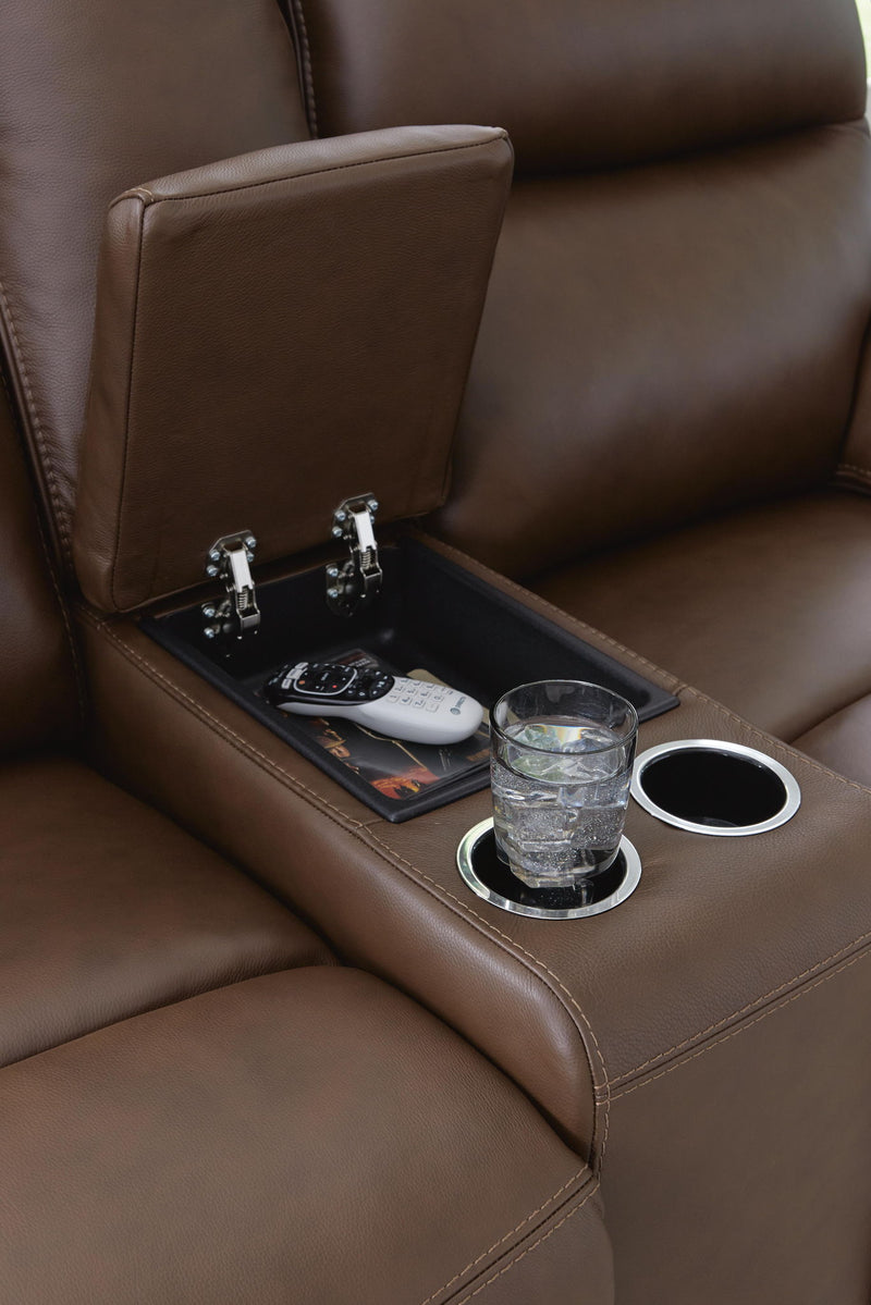 Vonryan - Power Reclining Loveseat With Console / Adj Headrest - Tobacco - R&R Furniture Gallery (Fountain Valley, CA)