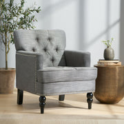 Noble House Harrison tufted club arm chair with button-tufted back and birch wood legs, upholstered in plush fabric.