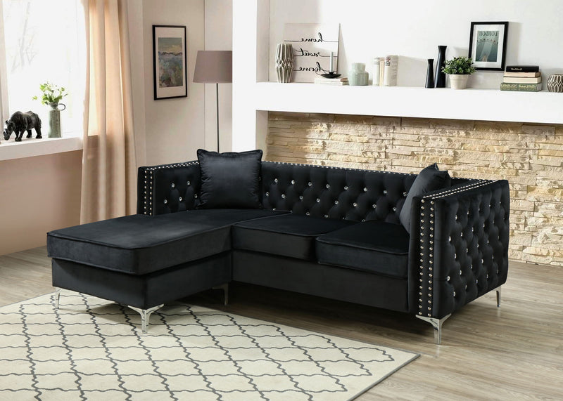 Glory Furniture Paige stationary sectional sofa with chaise, soft fabric upholstery and modern design, shown in a cozy living room setting.