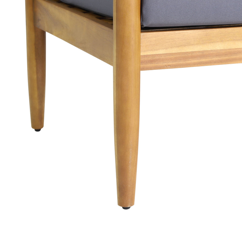 Outdoor 3 seater sofa by Noble House with dark gray cushions and teak acacia wood frame, suitable for patio or garden.