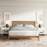 Ridgecrest Home Malinda panel bed with a classic wooden frame and headboard, shown in a cozy bedroom setting.