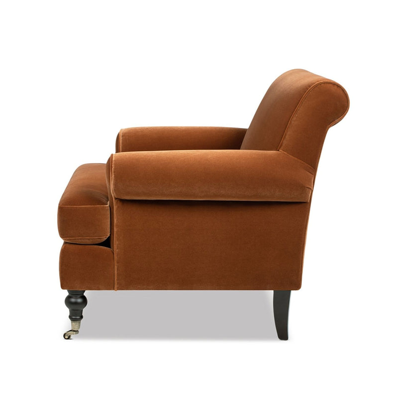 Jennifer Taylor Home Alana Lawson Accent Arm Chair with casters, beige fabric, and wooden legs in a stylish home setting.