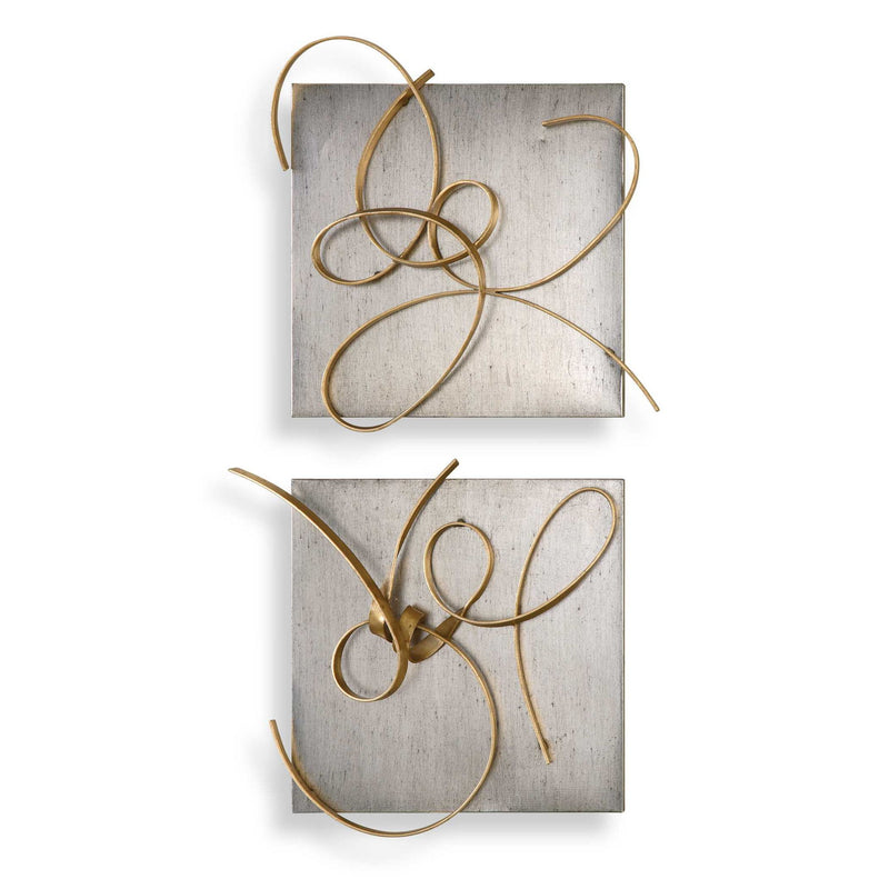 Set of two gold metal wall art pieces by Uttermost, modern wall decor with intricate geometric designs.