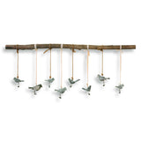 Light brown birds on a branch wall art by Uttermost, showcasing detailed bird and branch design for elegant wall decor.