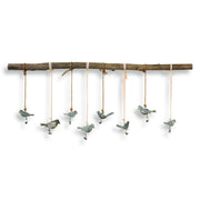 Light brown birds on a branch wall art by Uttermost, showcasing detailed bird and branch design for elegant wall decor.