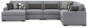 Benchcraft® Bealton sectional sofa in a stationary design with plush cushions and a neutral fabric finish.