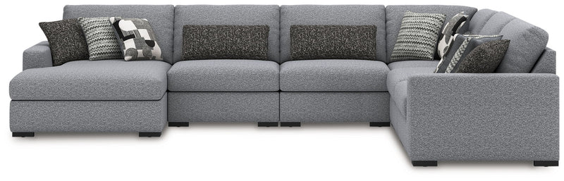 Benchcraft® Bealton sectional sofa in a stationary design with plush cushions and a neutral fabric finish.
