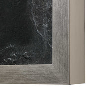 Set of six black framed foliage prints by Uttermost, featuring botanical artwork on white backgrounds for wall decor.