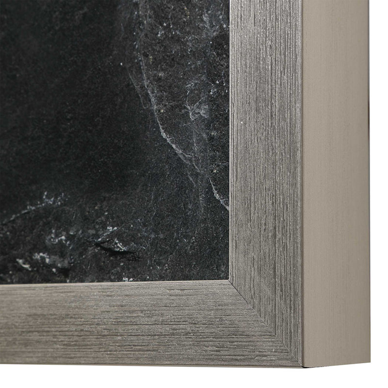 Set of six black framed foliage prints by Uttermost, featuring botanical artwork on white backgrounds for wall decor.