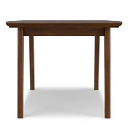 Simpli-Home Draper rectangular dining table with wooden top and sturdy legs, ideal for family meals and gatherings.