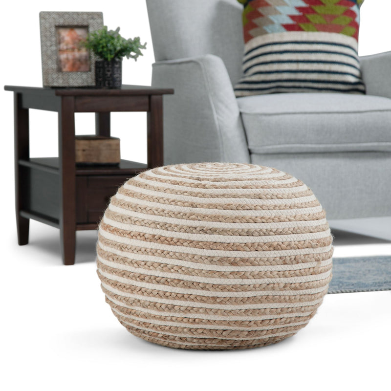 Simpli-Home Yolanda round natural accent pouf with soft fabric upholstery and plush cushioning for versatile seating.