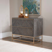 Uttermost Armistead dark walnut accent drawer chest with sleek, modern design and metal handles, standing on four tapered legs.