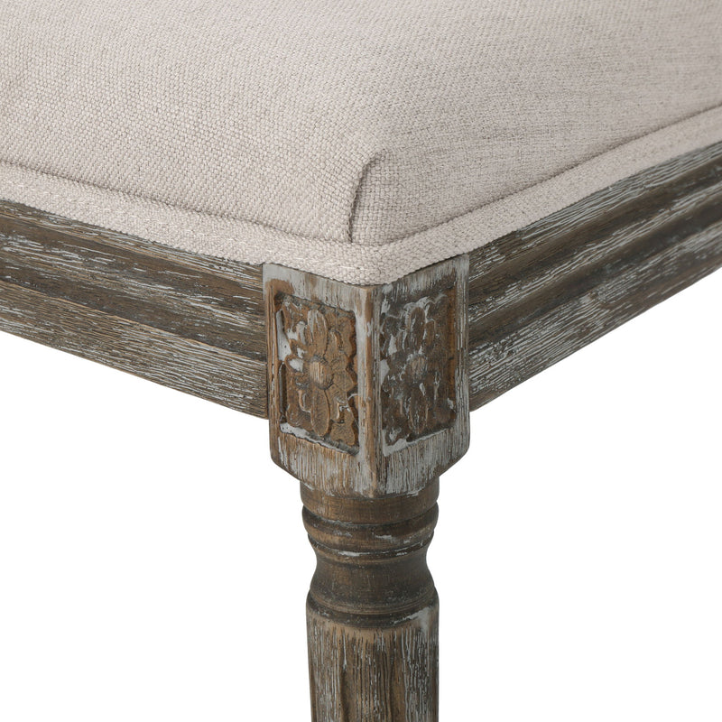 Noble House traditional style dining chair set with fabric upholstery, featuring wooden legs and elegant design for dining room decor.